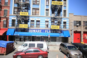 building, car, day, elevated, facade, Manhattan, New York, shop, stair, street, sunny, The United States