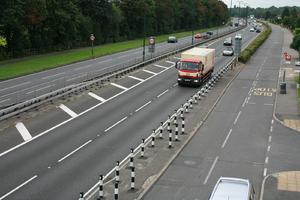 car, day, elevated, England, grass, guardrail, London, natural light, road, The United Kingdom, truck, vegetation