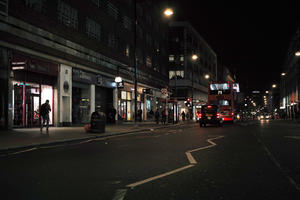 artificial lighting, bus, car, city lights, England, eye level view, London, night, outdoor lighting, street, taxi, The United Kingdom