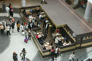 above, cafe, day, eating, elevated, England, group, indoor lighting, interior, London, mall, natural light, people, queuing, shopping centre, sitting, The United Kingdom
