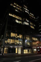 3-point perspective, artificial lighting, England, eye level view, facade, glass, London, night, office, office building, outdoor lighting, street, The United Kingdom, winter