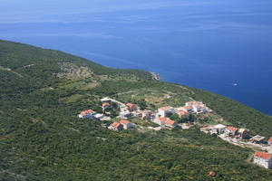 above, aerial view, bright, day, greenery, island, looking down, shore, summer, sunny, village