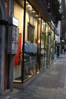 artificial lighting, Bari, evening, eye level view, Italia , pavement, Puglia, retail, shop, winter