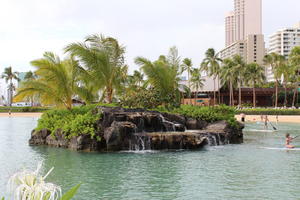 day, diffuse, diffused light, eye level view, greenery, Hawaii, natural light, palm, resort, summer, The United States, tropical, waterfall