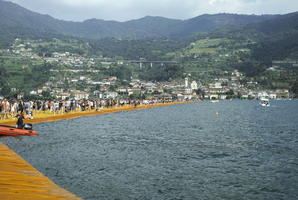 crowd, day, eye level view, Italia , lake, Lombardia, Monte Isola, mountain, platform, summer, sunny, walking