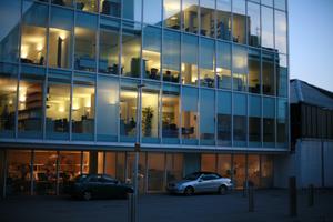 architecture, artificial lighting, building, car, dusk, England, eye level view, facade, glass, London, office, The United Kingdom, urban