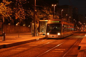 artificial lighting, evening, eye level view, night, Porto, Porto, Portugal, spring, street, tram, tramlines
