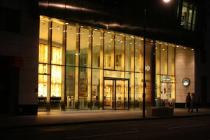 artificial lighting, England, entrance, evening, eye level view, London, office building, outdoor lighting, street, summer, The United Kingdom