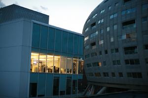artificial lighting, building, dusk, England, evening, eye level view, facade, London, office, spring, The United Kingdom