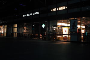 artificial lighting, cafe, England, eye level view, London, night, pavement, spring, The United Kingdom, urban
