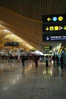 airport, artificial lighting, Barajas Airport, building, ceiling, day, eye level view, floor, Madrid, sign, Spain
